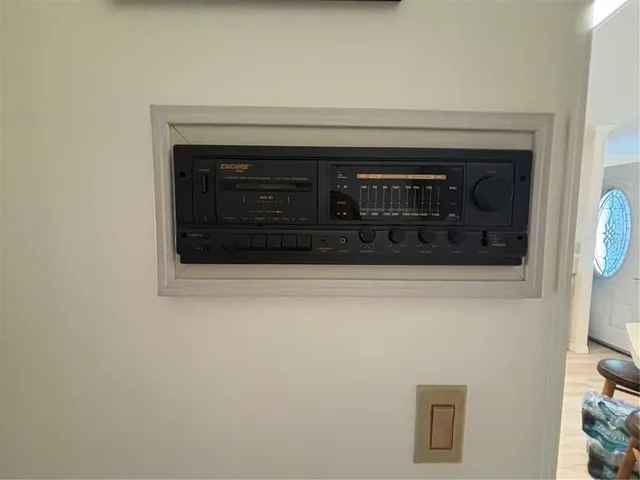 a bathroom with a stove and a microwave