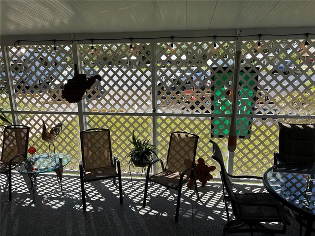 a view of balcony and chairs