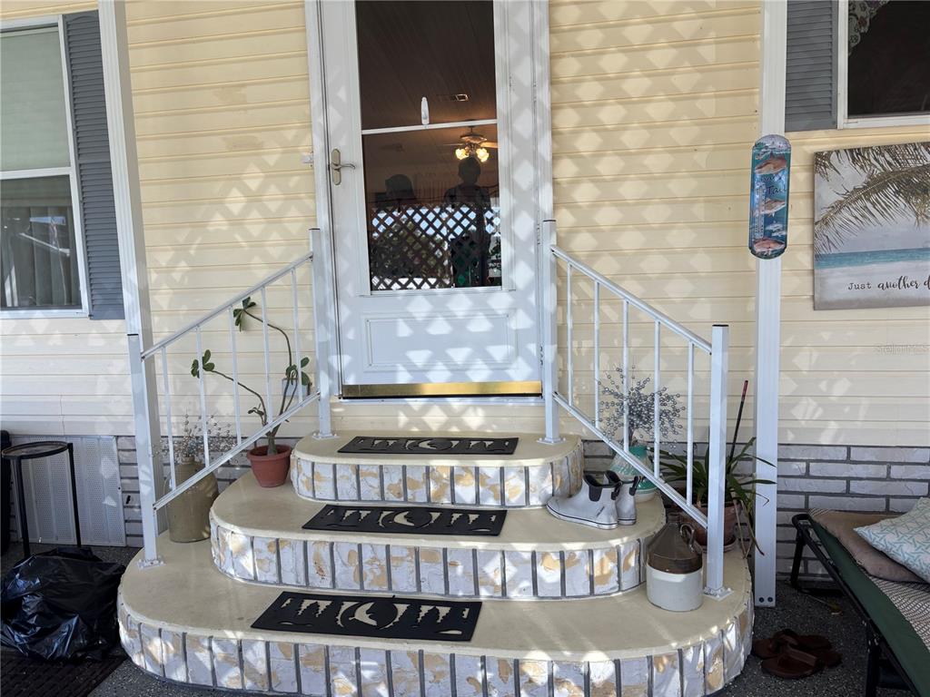 1759 Southwest 35th Circle Okeechobee, FL 34974 - Photo 2 of 29 a view of a balcony with furniture