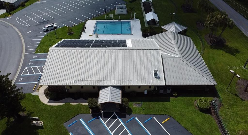 1759 Southwest 35th Circle Okeechobee, FL 34974 - Photo 28 of 29 an aerial view of a house with swimming pool and garden