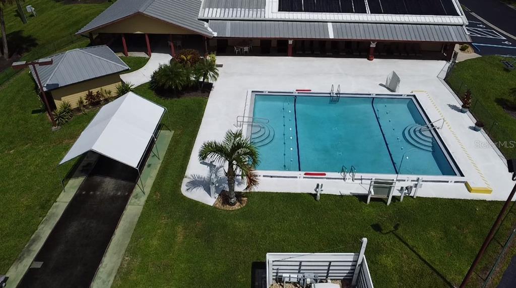 1759 Southwest 35th Circle Okeechobee, FL 34974 - Photo 29 of 29 an aerial view of a house with a garden