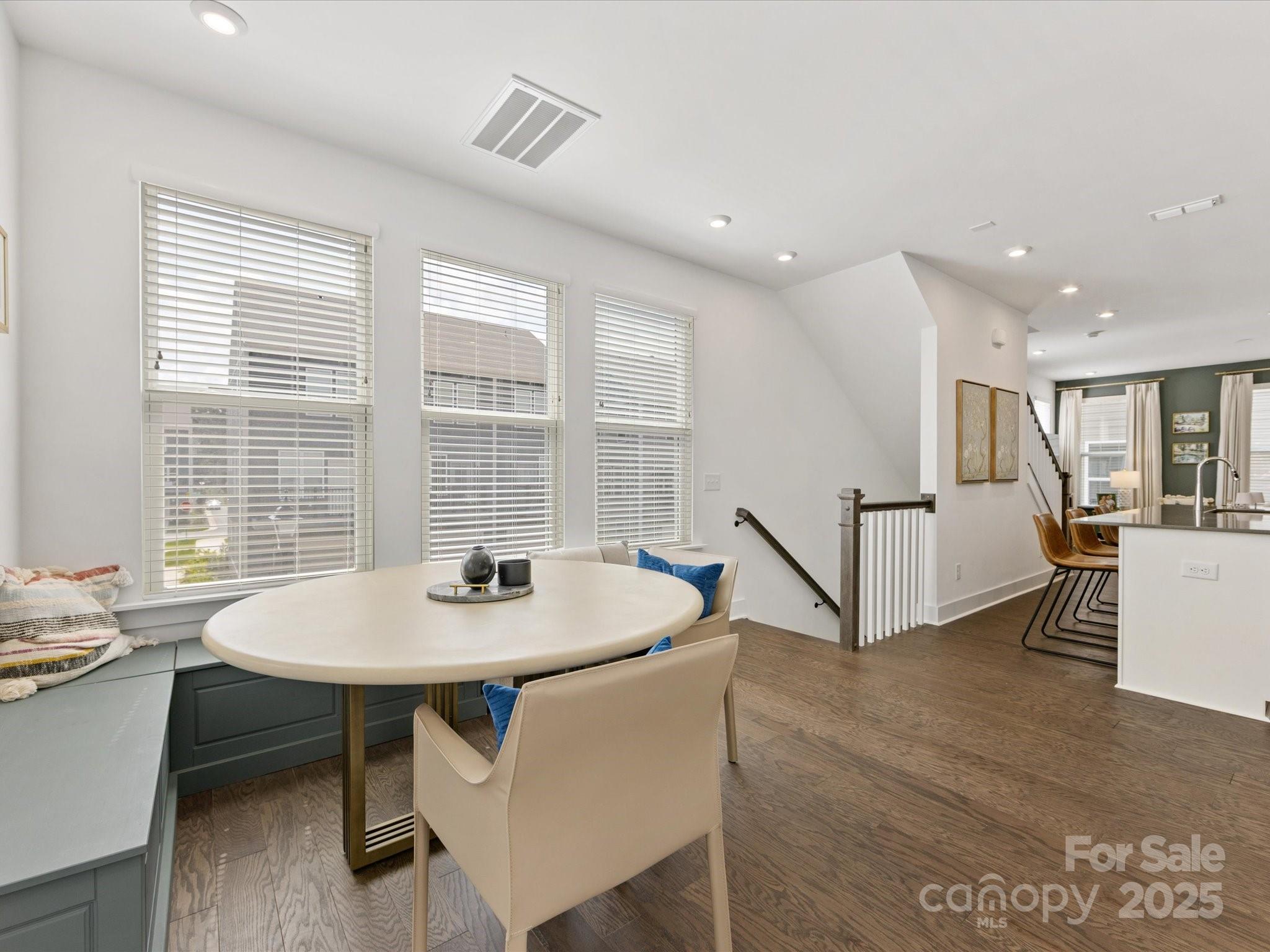 4027 Capital Ridge, Unit 10 Charlotte, NC 28205 - Photo 17 of 34 a view of a dining room with furniture and window