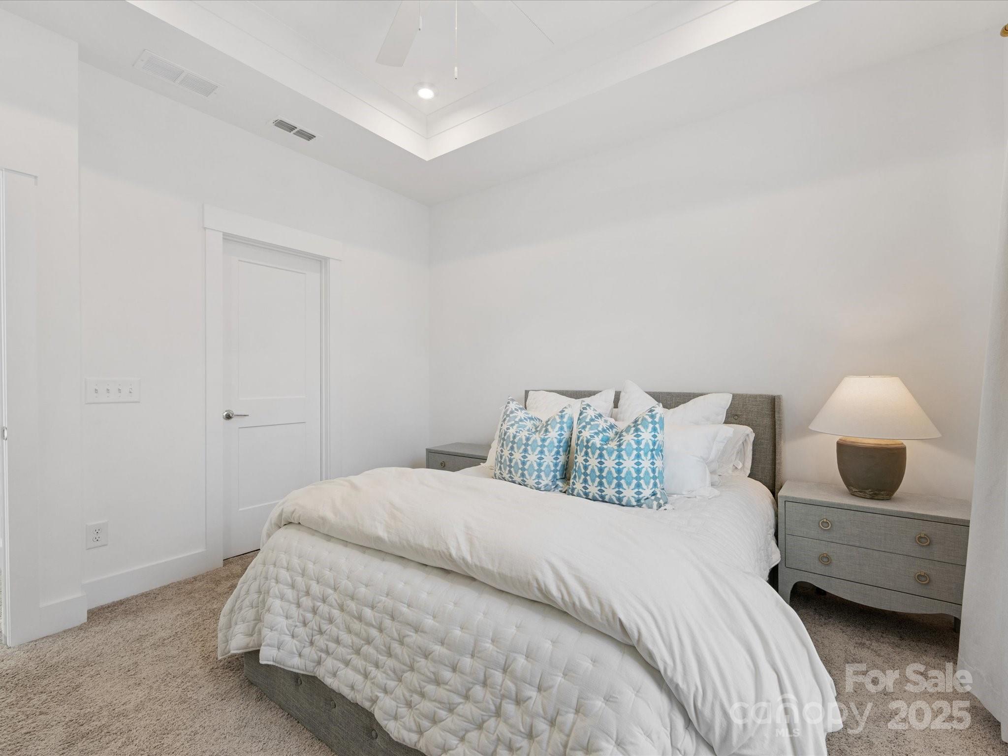 4027 Capital Ridge, Unit 10 Charlotte, NC 28205 - Photo 23 of 34 a bedroom with a bed and window