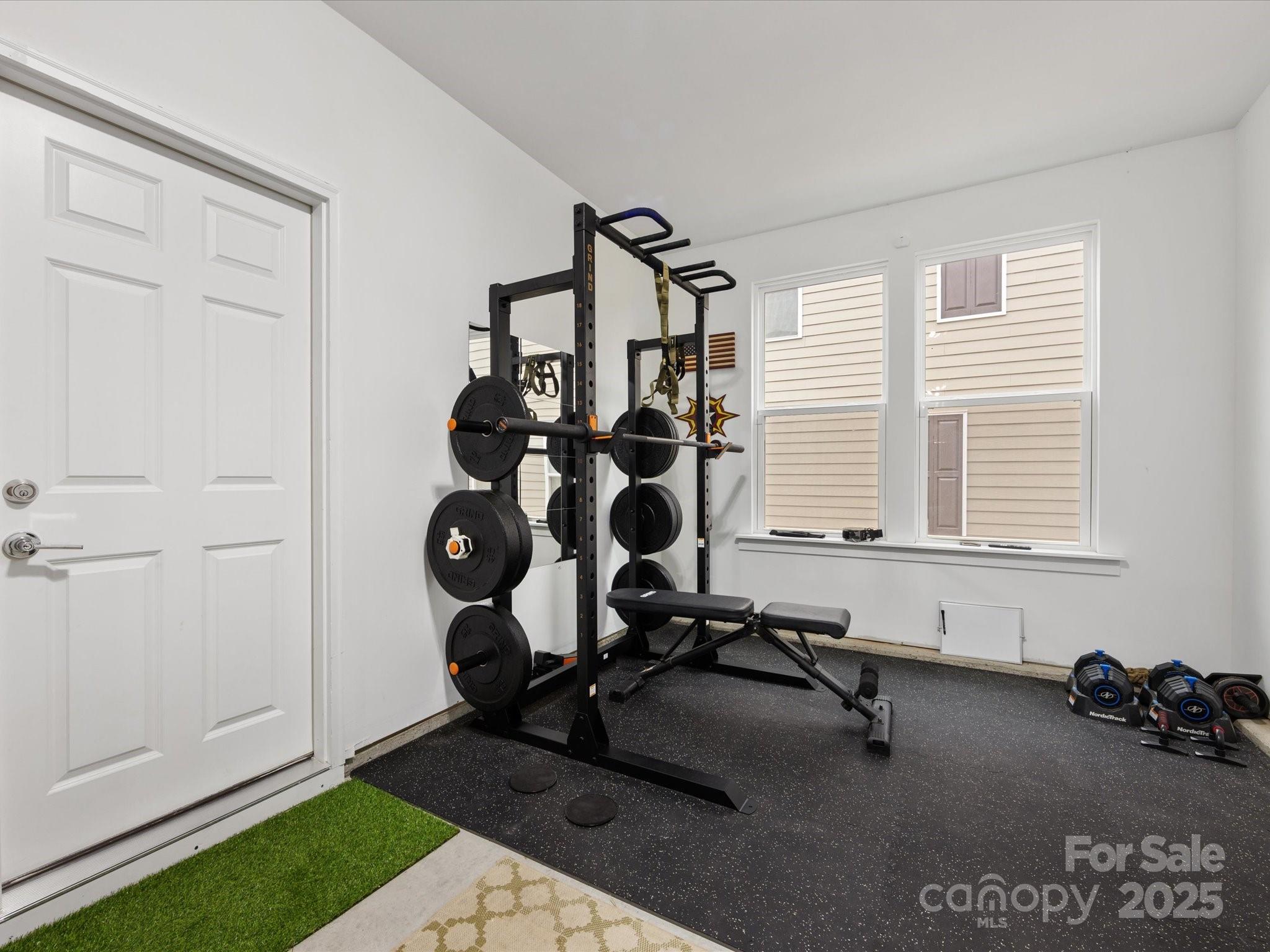 4027 Capital Ridge, Unit 10 Charlotte, NC 28205 - Photo 34 of 34 a view of a room with gym equipment