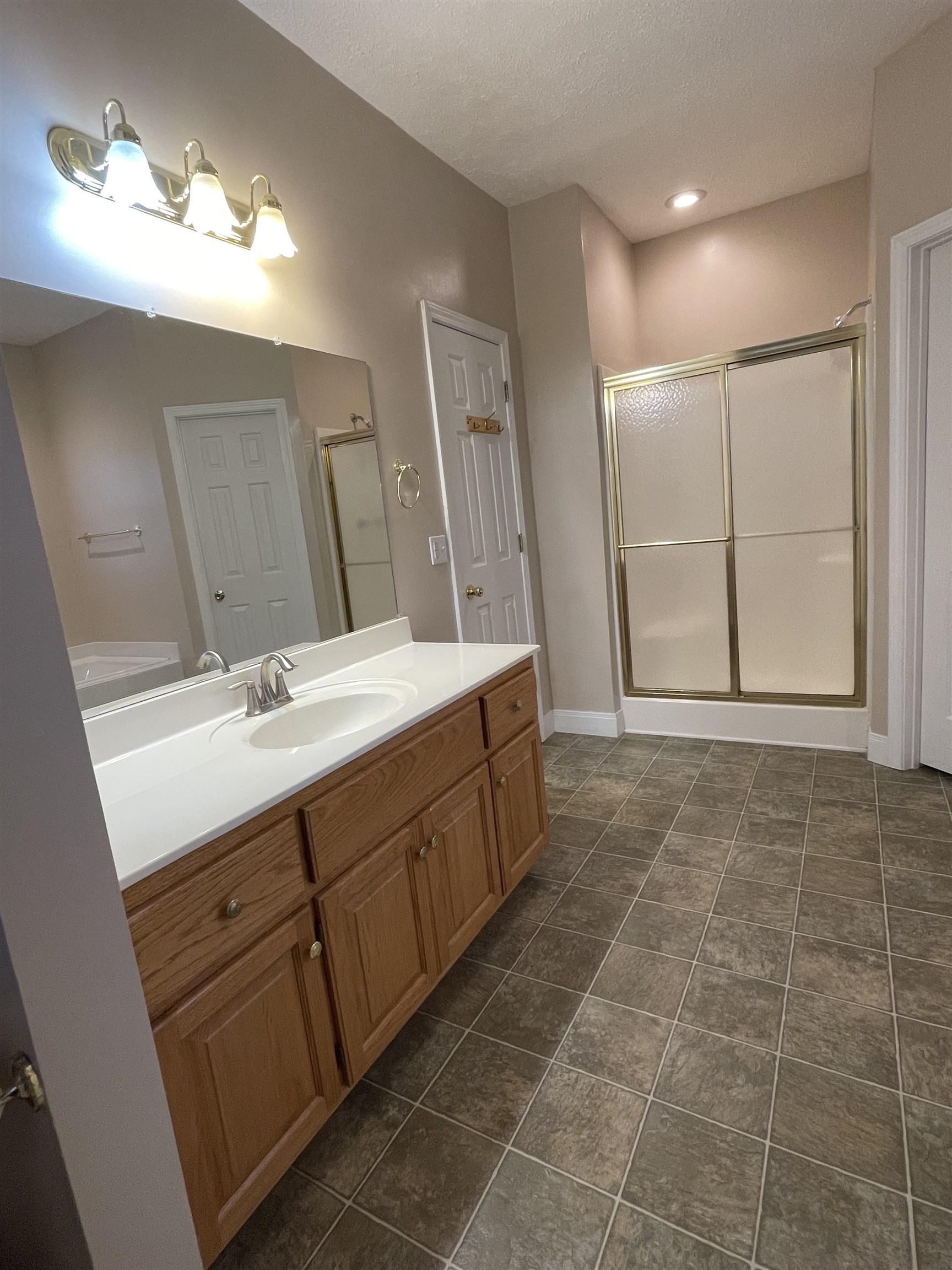 305 New Hope Road Ramer, TN 38367 - Photo 20 of 25 a bathroom with a double vanity sink mirror and