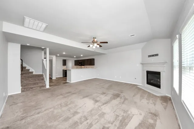 a bathroom with a sink vanity and mirror