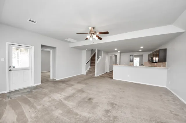 a bathroom with a bathtub and shower
