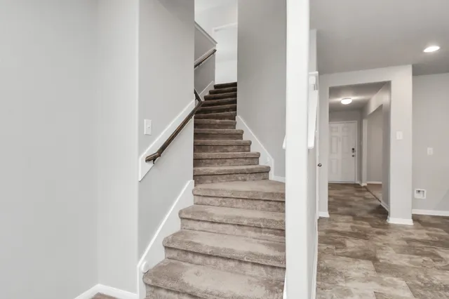 a backyard of a house with lots of green space