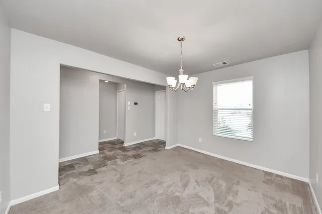 a large kitchen with stainless steel appliances granite countertop plenty of counter space