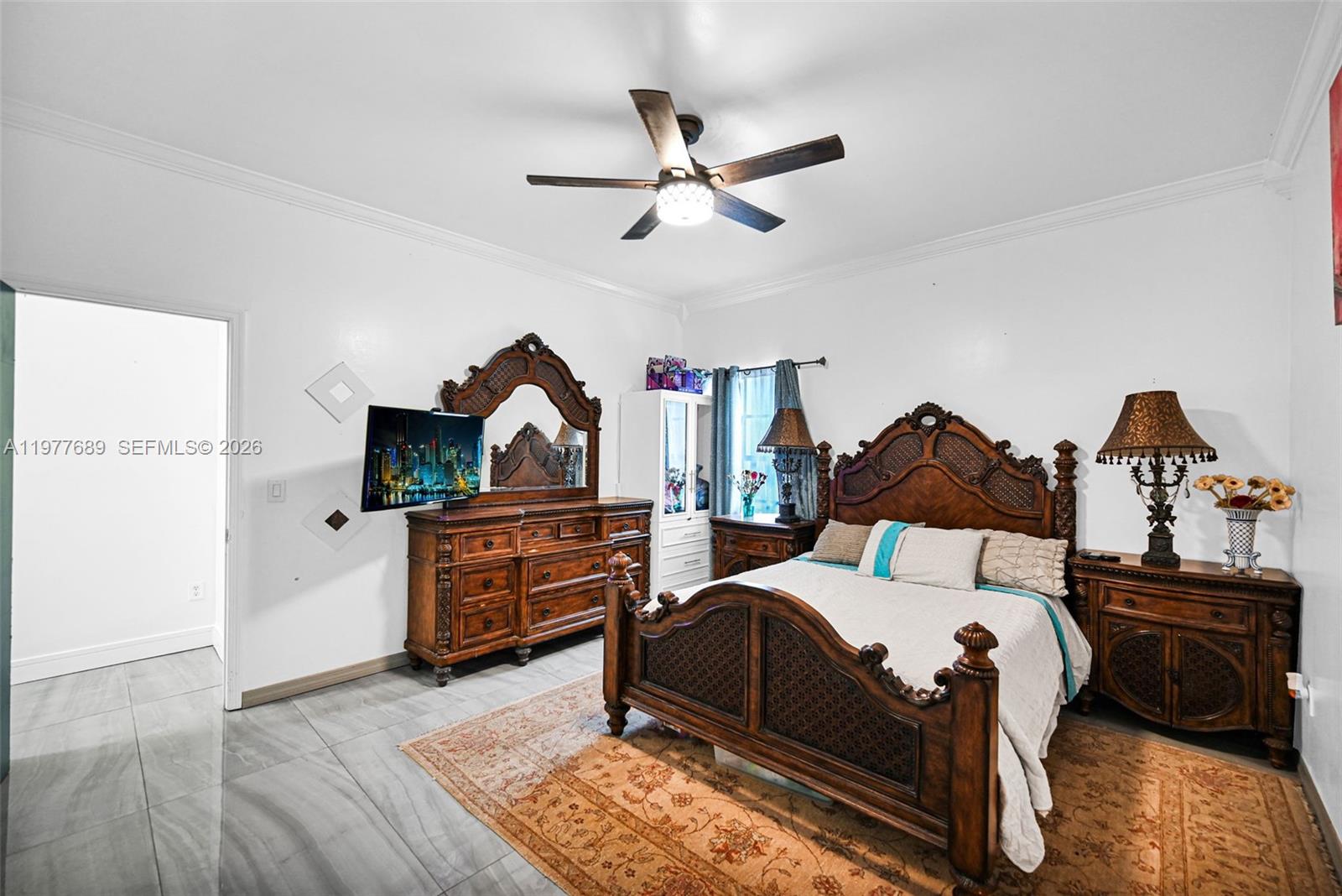 18950 Southwest 50th Street Southwest Ranches, FL 33332 - Photo 35 of 63 a bedroom with furniture and a bed