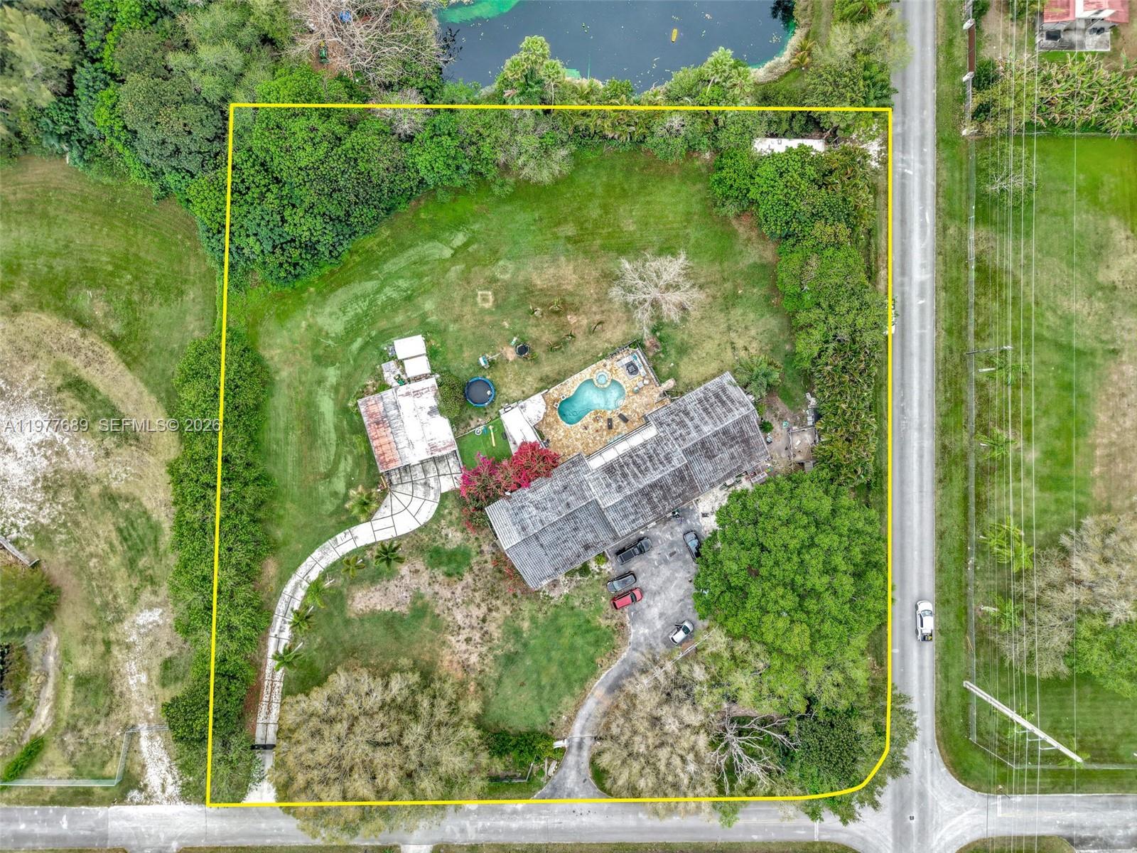 18950 Southwest 50th Street Southwest Ranches, FL 33332 - Photo 59 of 63 a view of a yard