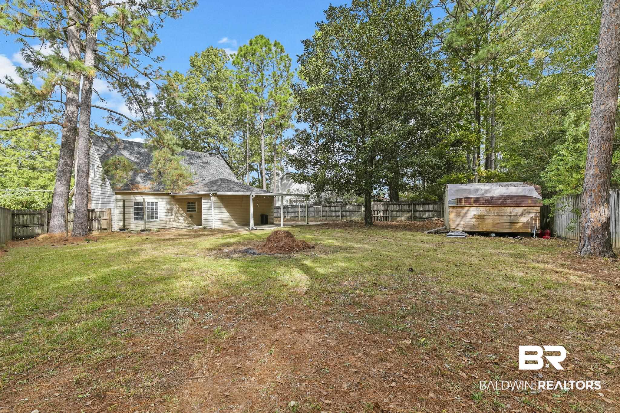 474 Ridgewood Drive Daphne, AL 36526 - Photo 52 of 57 View of yard with a shed