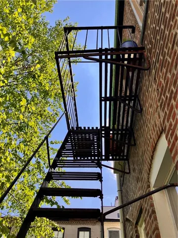 a bathroom with a sink toilet and mirror