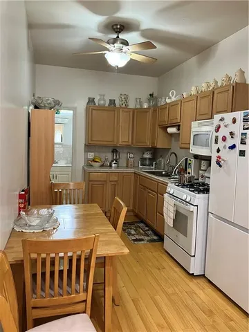a view of a room with lots of wooden floor