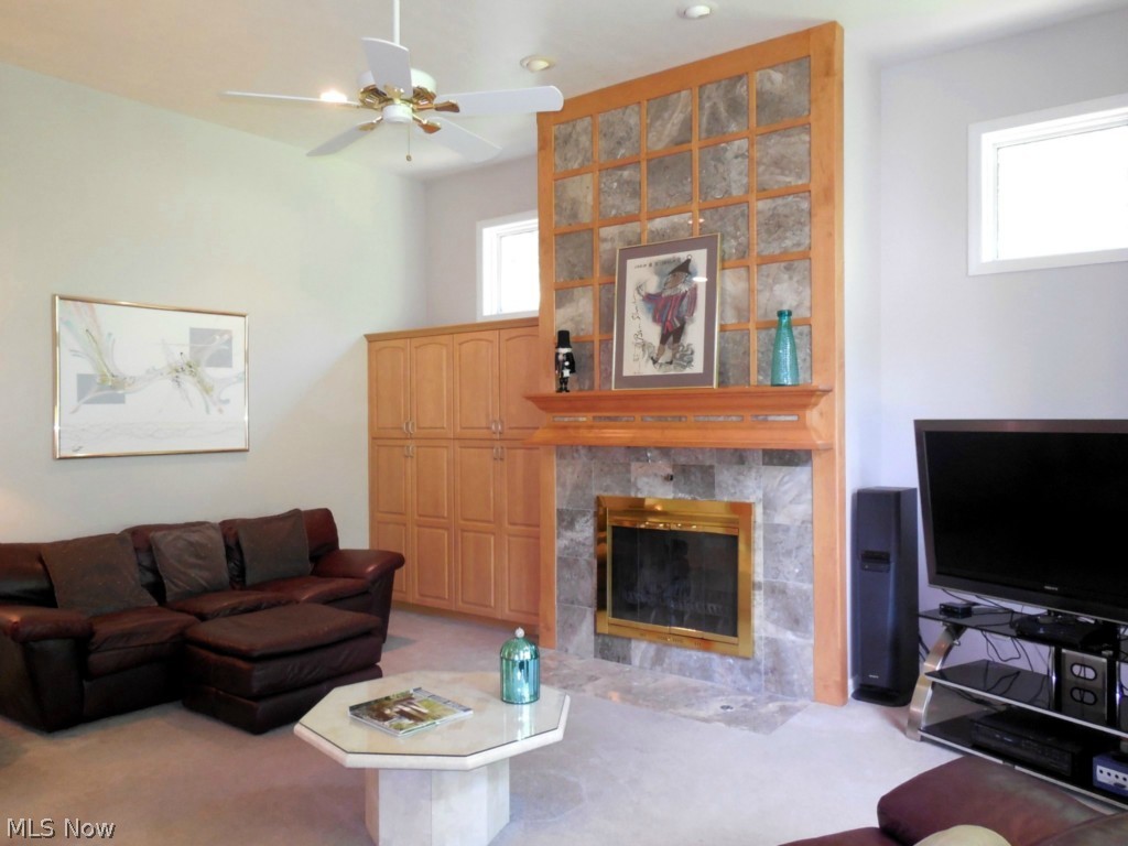 7071 Liberty Road Solon, OH 44139 - Photo 9 of 25 Great Room with marble fireplace and built ins.