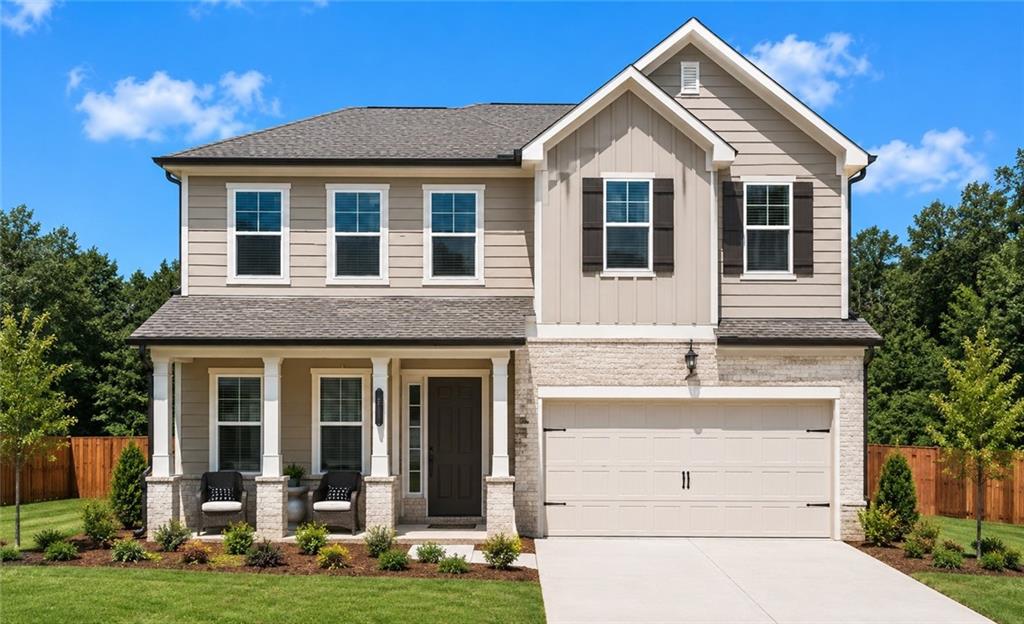 204 Paisley Way Locust Grove, GA 30248 - Photo 1 of 29 a front view of a house with a yard