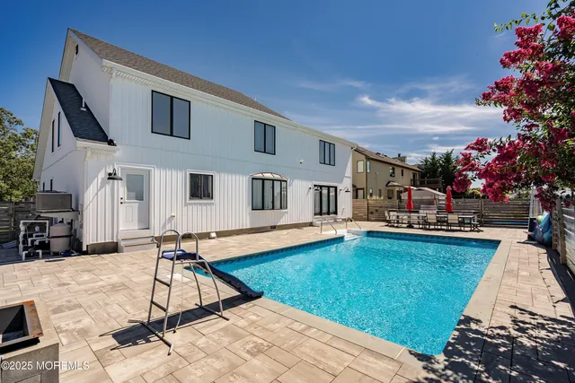 an aerial view of a house with a garden