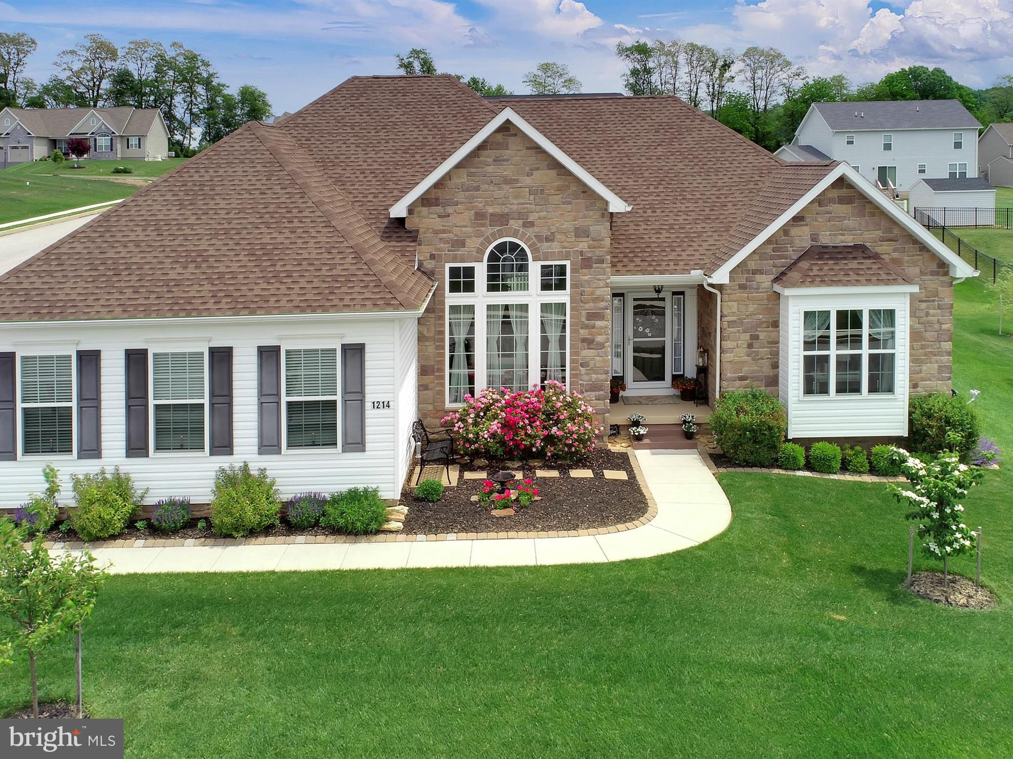 1214 Bair Road Hanover, PA 17331 - Photo 3 of 43 a front view of a house with a garden