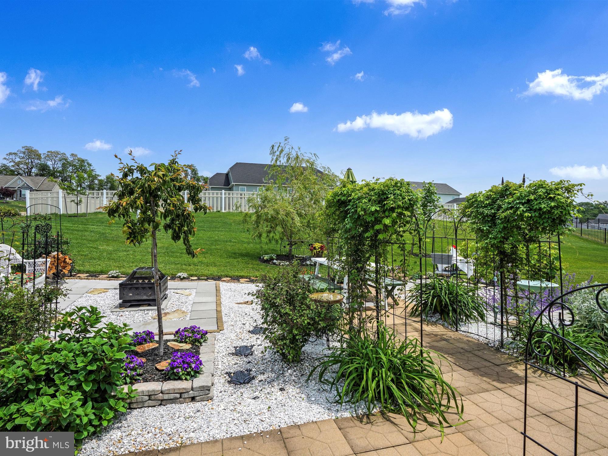 1214 Bair Road Hanover, PA 17331 - Photo 39 of 43 a view of a garden with a building in the background