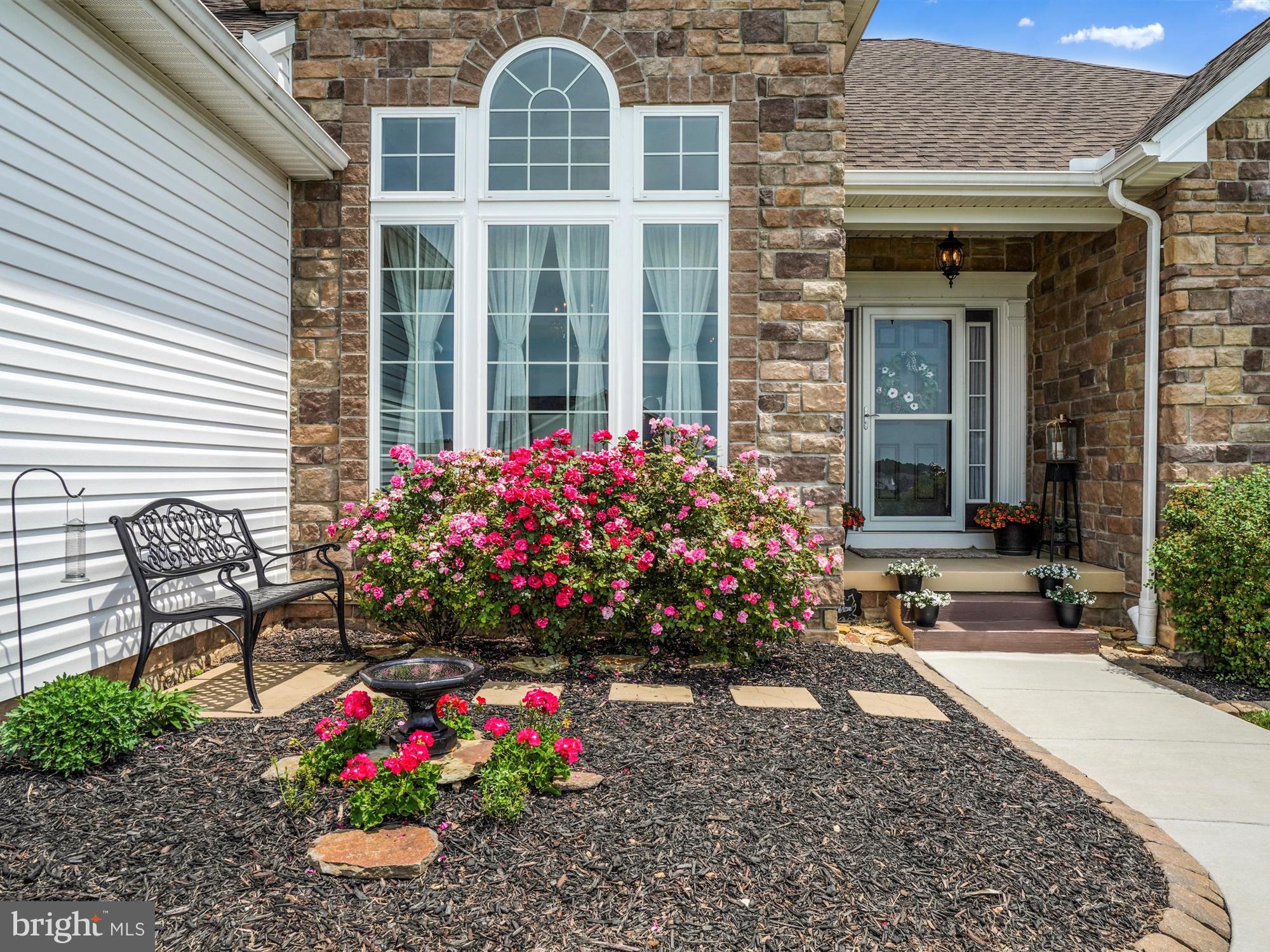 1214 Bair Road Hanover, PA 17331 - Photo 7 of 43 a view of a potted plant sitting in front of a house
