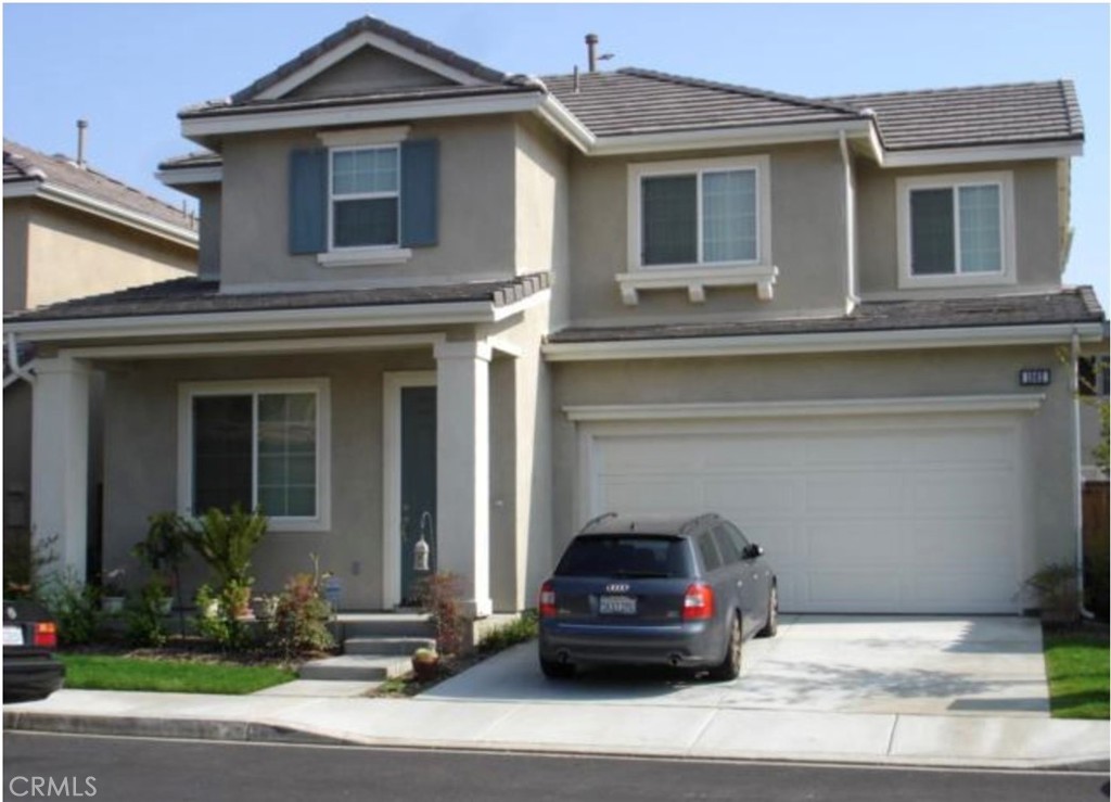 a car parked in front of a house