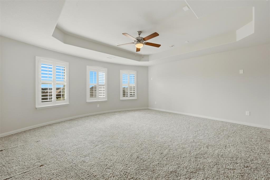 418 Crestview Drive Midlothian, TX 76065 - Photo 26 of 39 Flex room with a ceiling fan and a raised ceiling. Wired for media room and can be used as media, theater, game room, or additional bedroom!