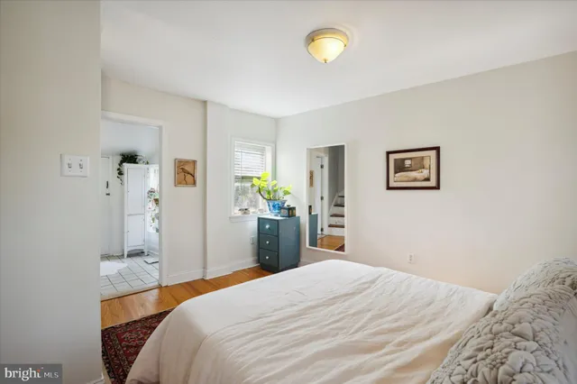 a bedroom with a bed and a cabinets