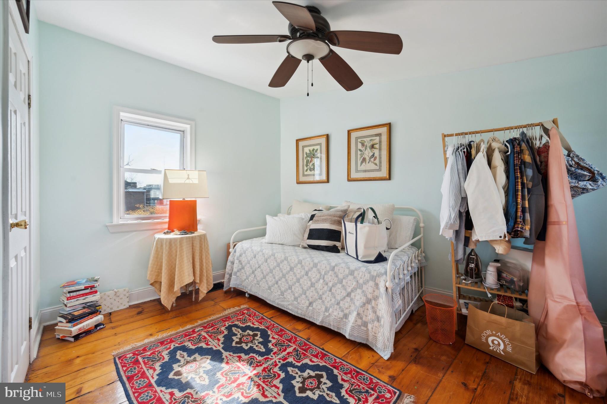1125 East Moyamensing Avenue Philadelphia, PA 19147 - Photo 21 of 25 a bedroom with bed and a window