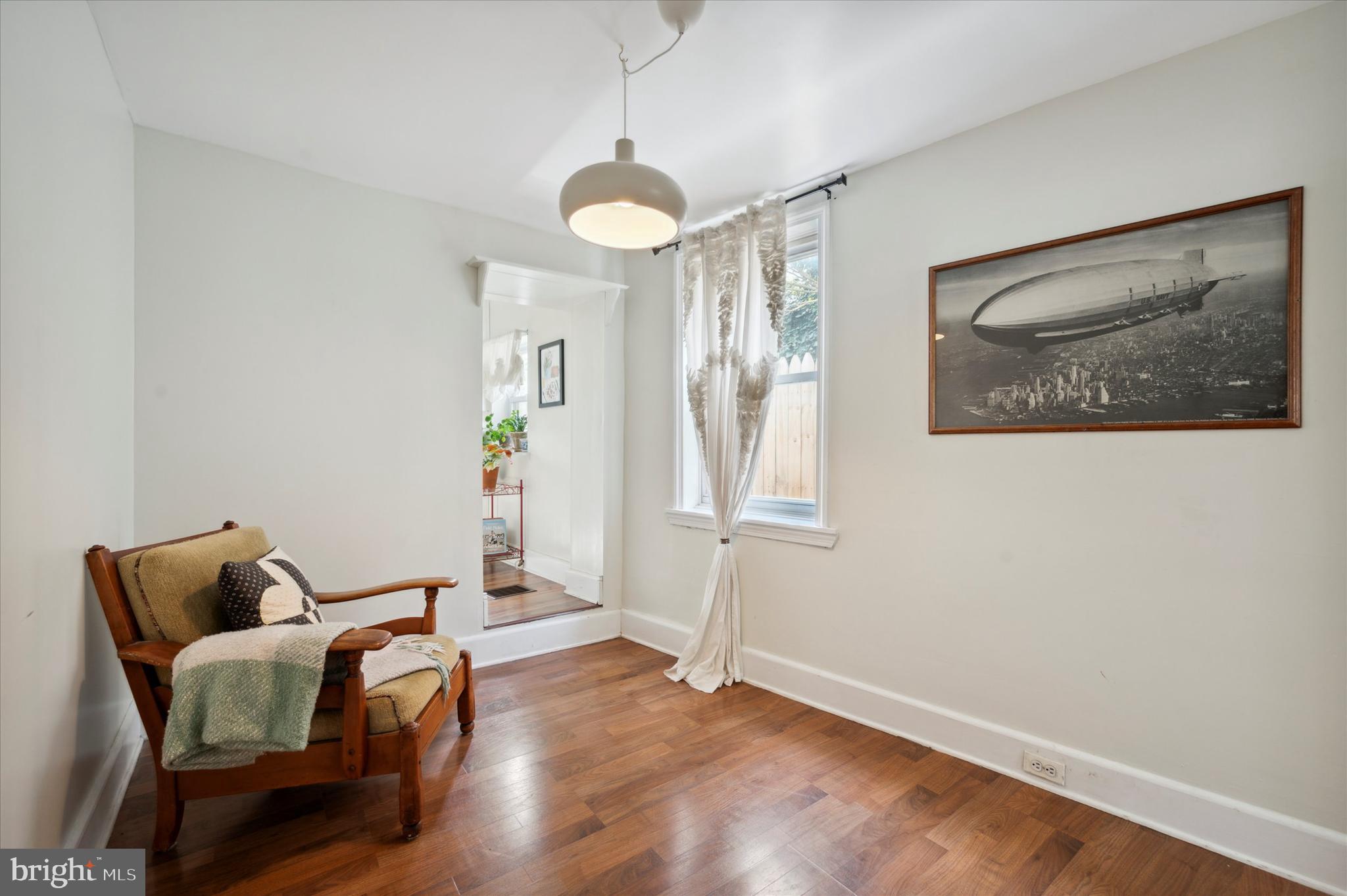 1125 East Moyamensing Avenue Philadelphia, PA 19147 - Photo 10 of 25 a living room with furniture and a window