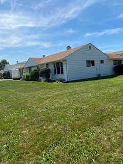 8732 South Corcoran Road, Unit 8732 Hometown, IL 60456 - Photo 3 of 22 a house view with a garden space