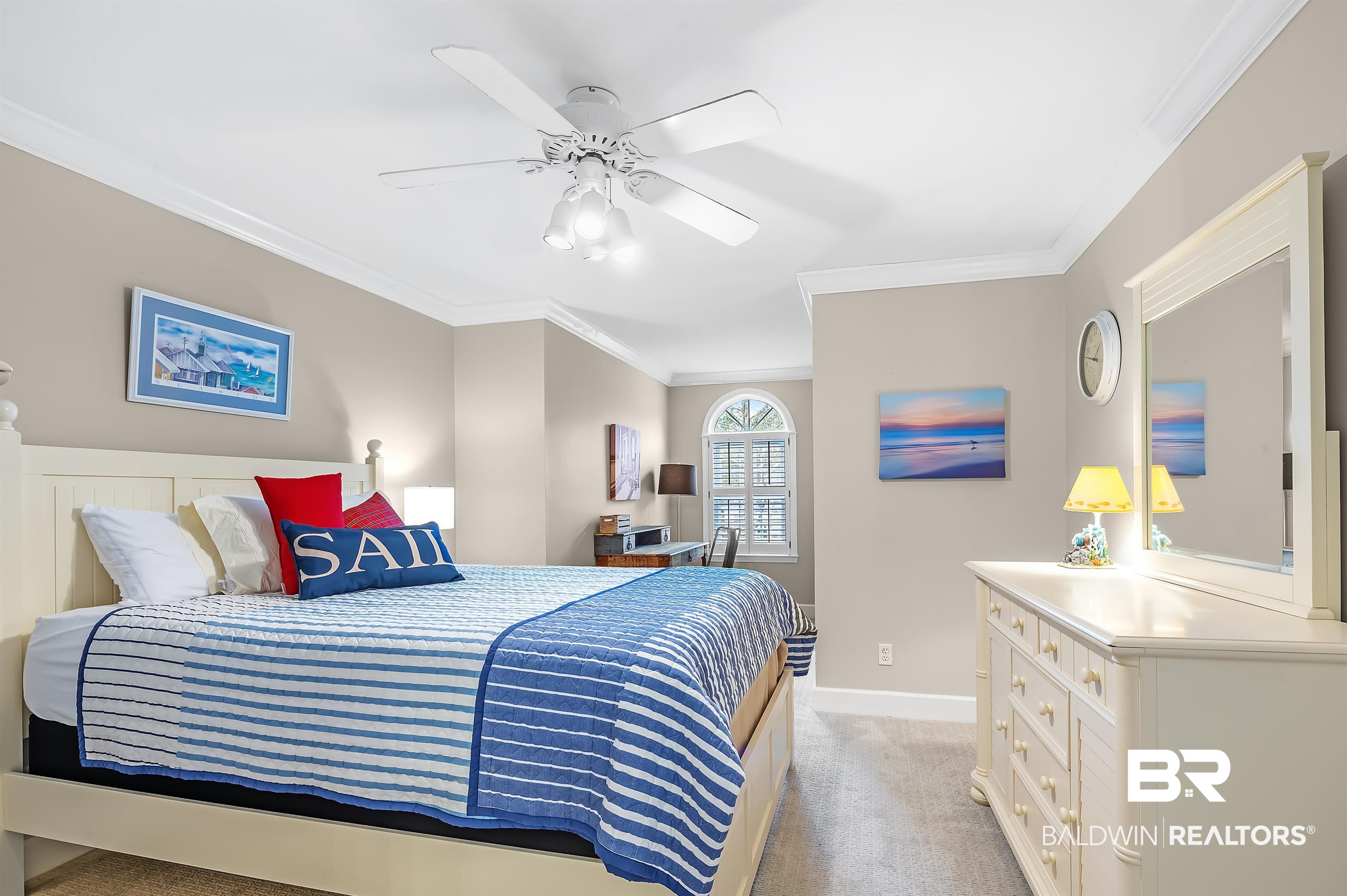 8915 Bay Point Drive Elberta, AL 36530 - Photo 72 of 74 Bedroom featuring baseboards, ceiling fan, ornamental molding, and light colored carpet
