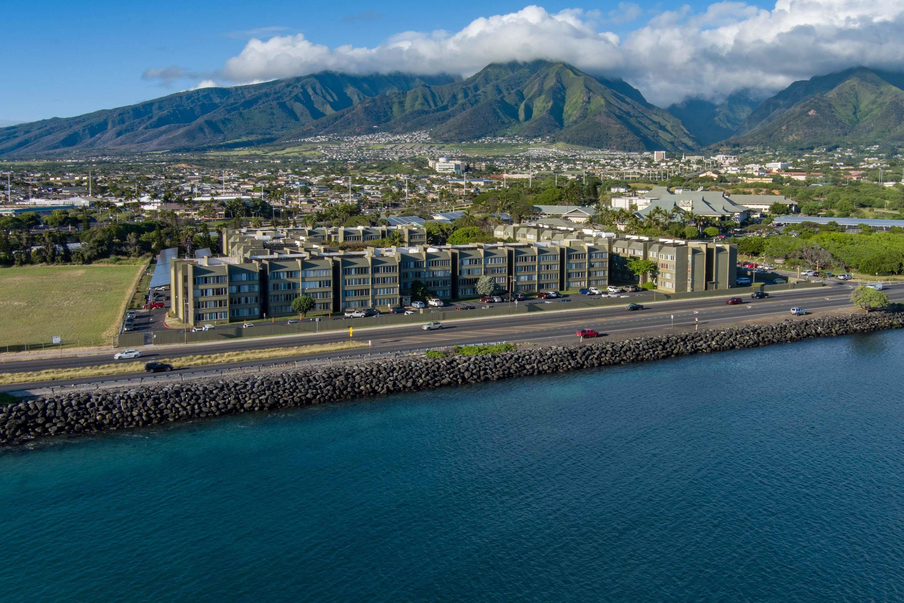 111 Kahului Beach Road, Unit D225 Kahului, HI 96732 - Photo 1 of 31 a view of a big yard next to a building