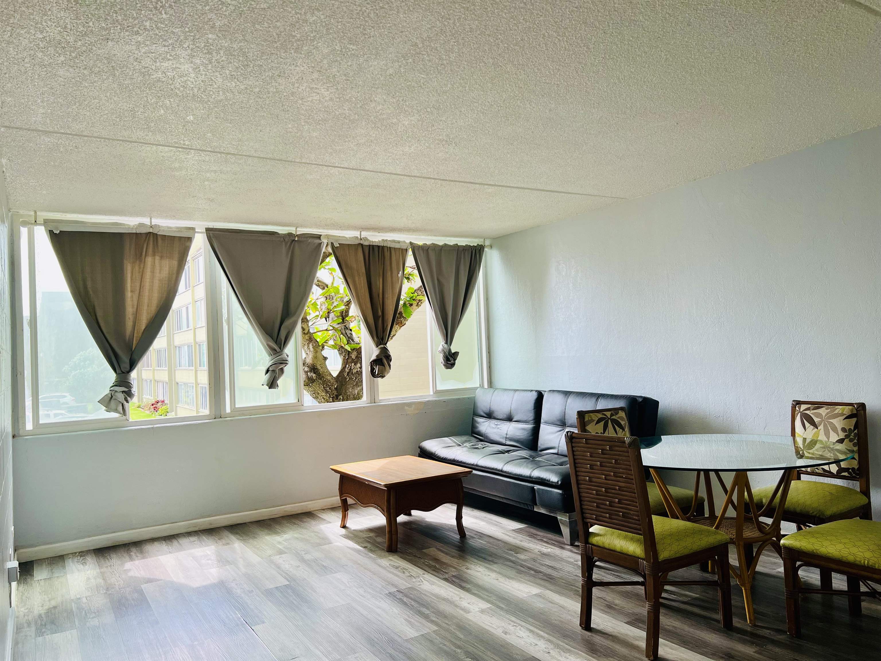 111 Kahului Beach Road, Unit D225 Kahului, HI 96732 - Photo 19 of 31 a living room with furniture and a window