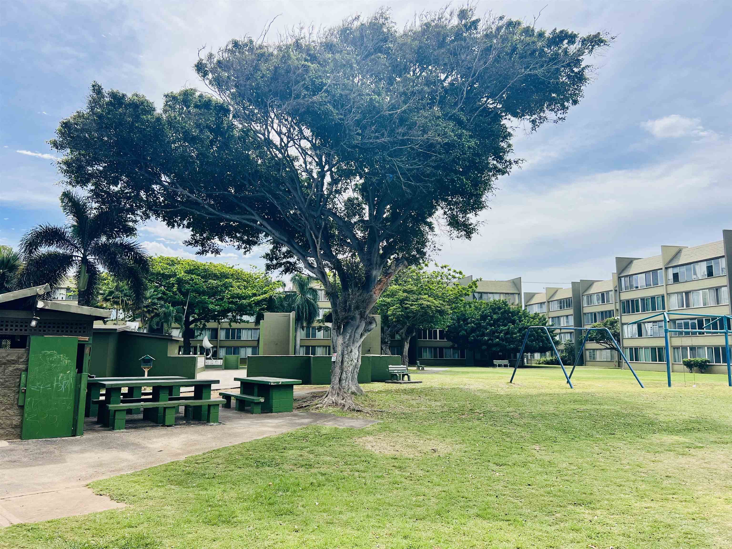 111 Kahului Beach Road, Unit D225 Kahului, HI 96732 - Photo 26 of 31 a view of a park with slide and a bench