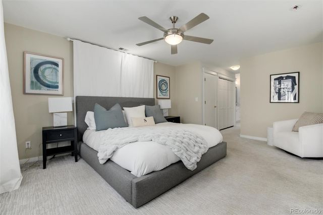 a en suite bathroom with double sink and a mirror