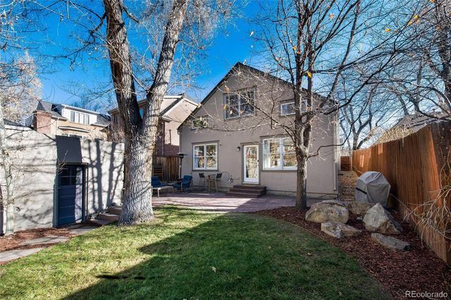 a view of a chairs and tables in the patio