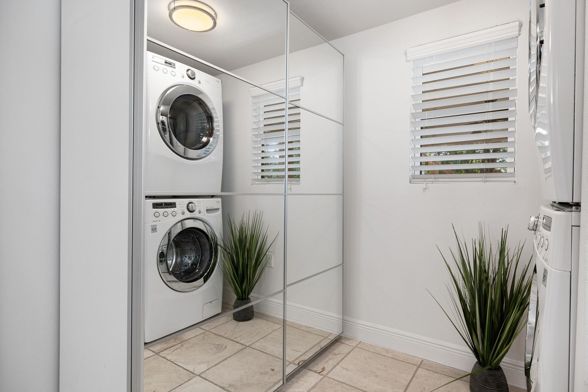 13566 Bullick Hollow Road Austin, TX 78726 - Photo 26 of 32 a utility room with dryer and washer