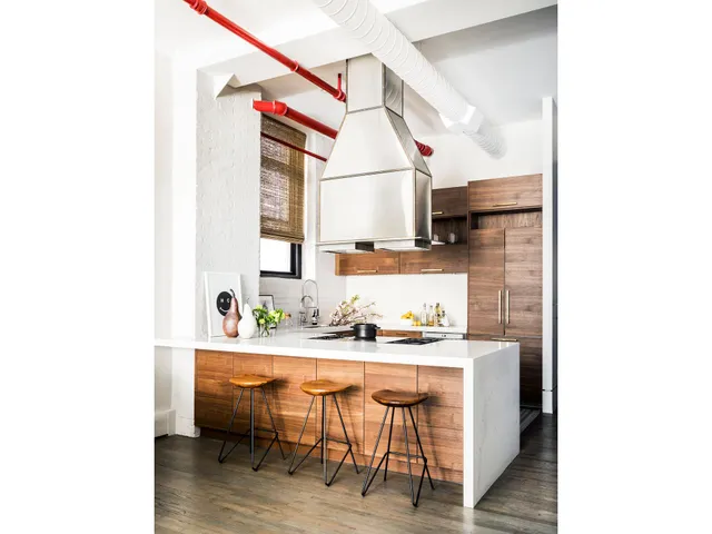 a room with a sink and a mirror