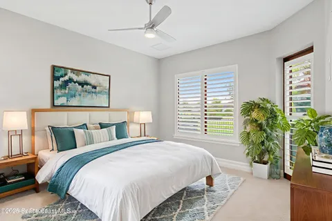a view of a kitchen with sink and cabinets