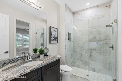 a swimming pool with outdoor seating