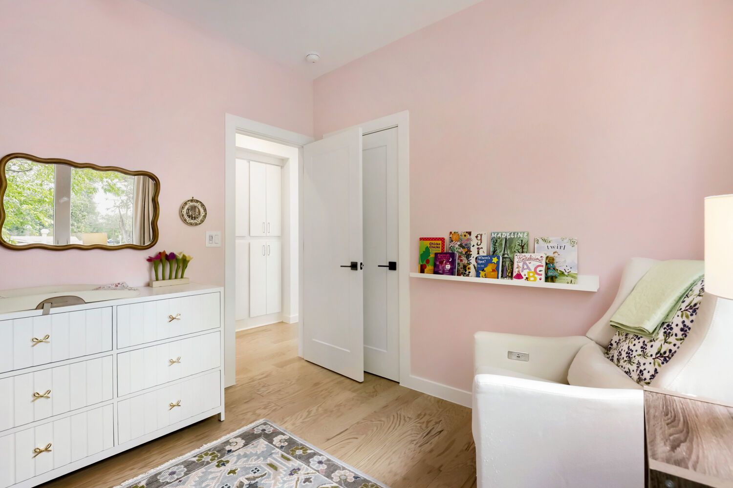 4804 Ribbecke Avenue, Unit A Austin, TX 78721 - Photo 17 of 32 This bright room features light pink walls and light wood flooring