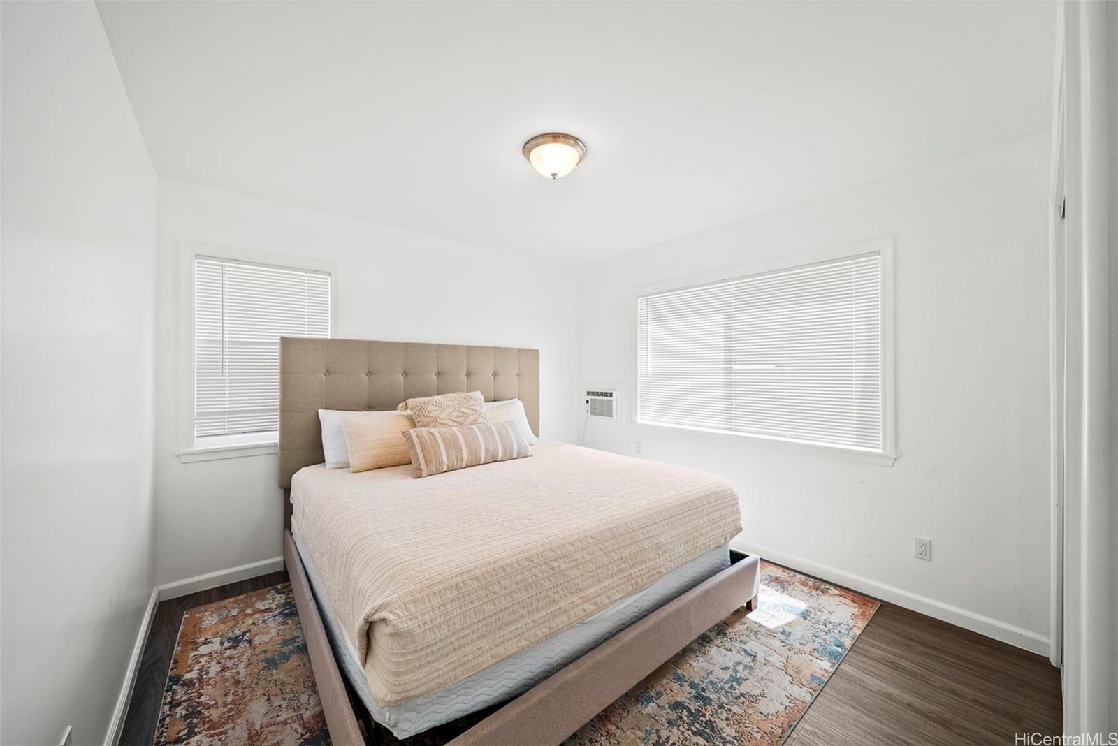 87-1446 Akowai Road Waianae, HI 96792 - Photo 18 of 23 a bedroom with a bed and a window