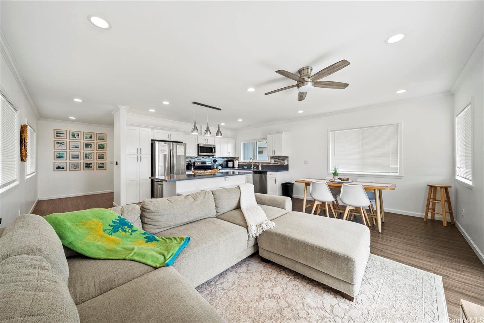 87-1446 Akowai Road Waianae, HI 96792 - Photo 5 of 23 a living room with furniture kitchen view and a table