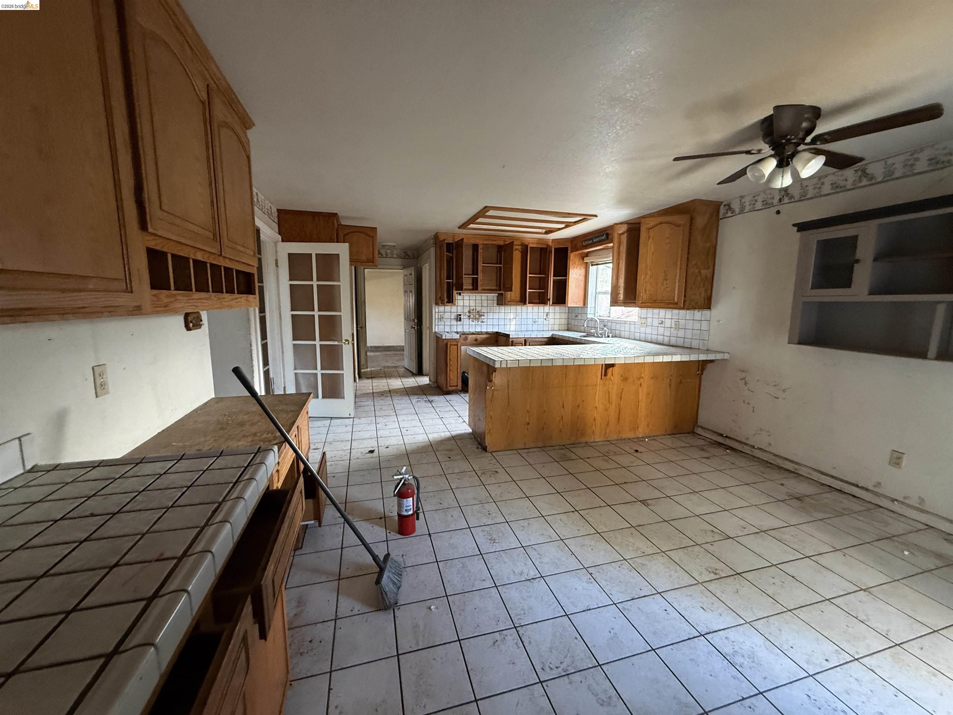 471 Delta Road Oakley, CA 94561 - Photo 17 of 33 a view of kitchen with granite countertop cabinets and window