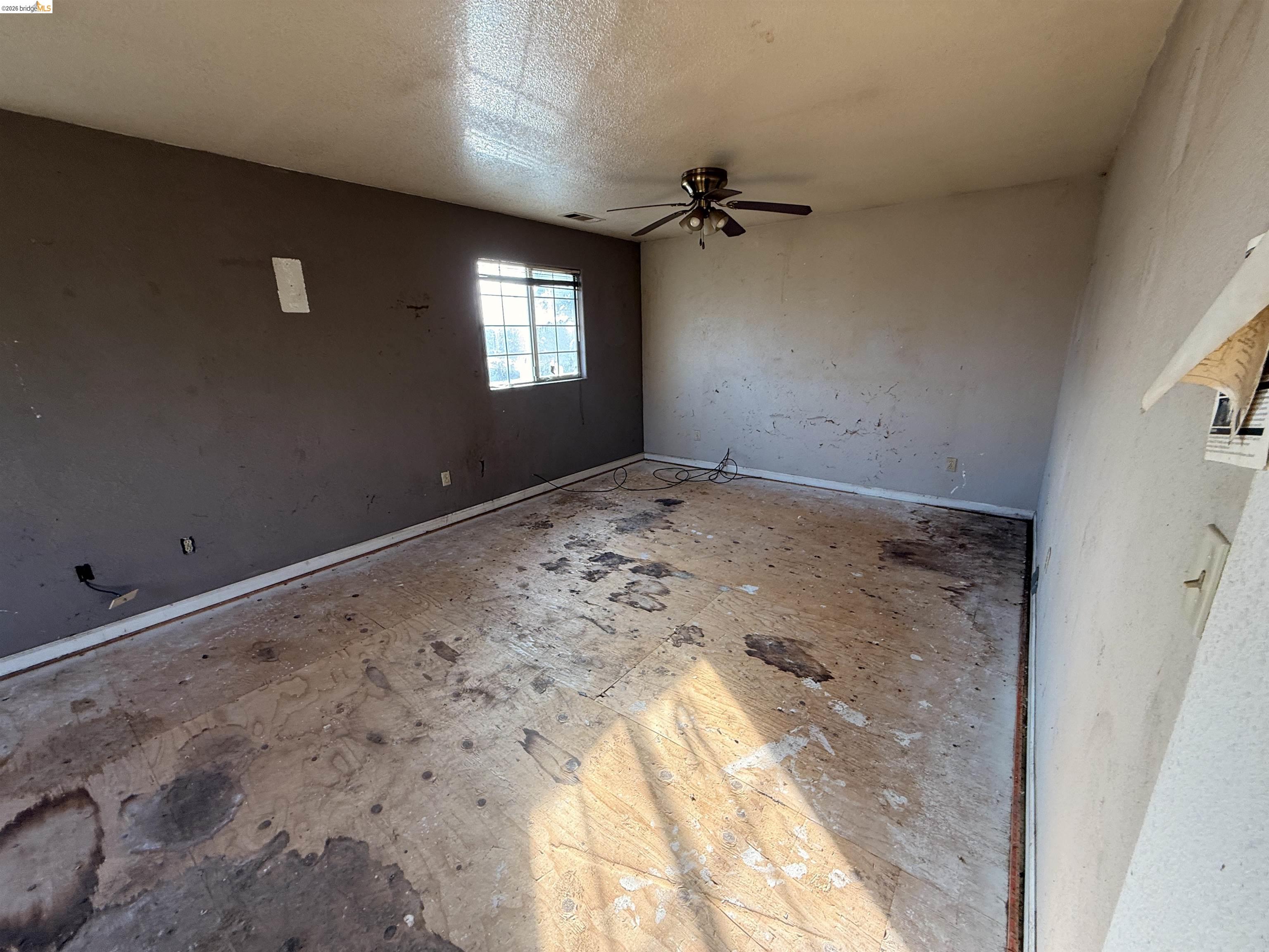 471 Delta Road Oakley, CA 94561 - Photo 5 of 33 a view of empty room with windows