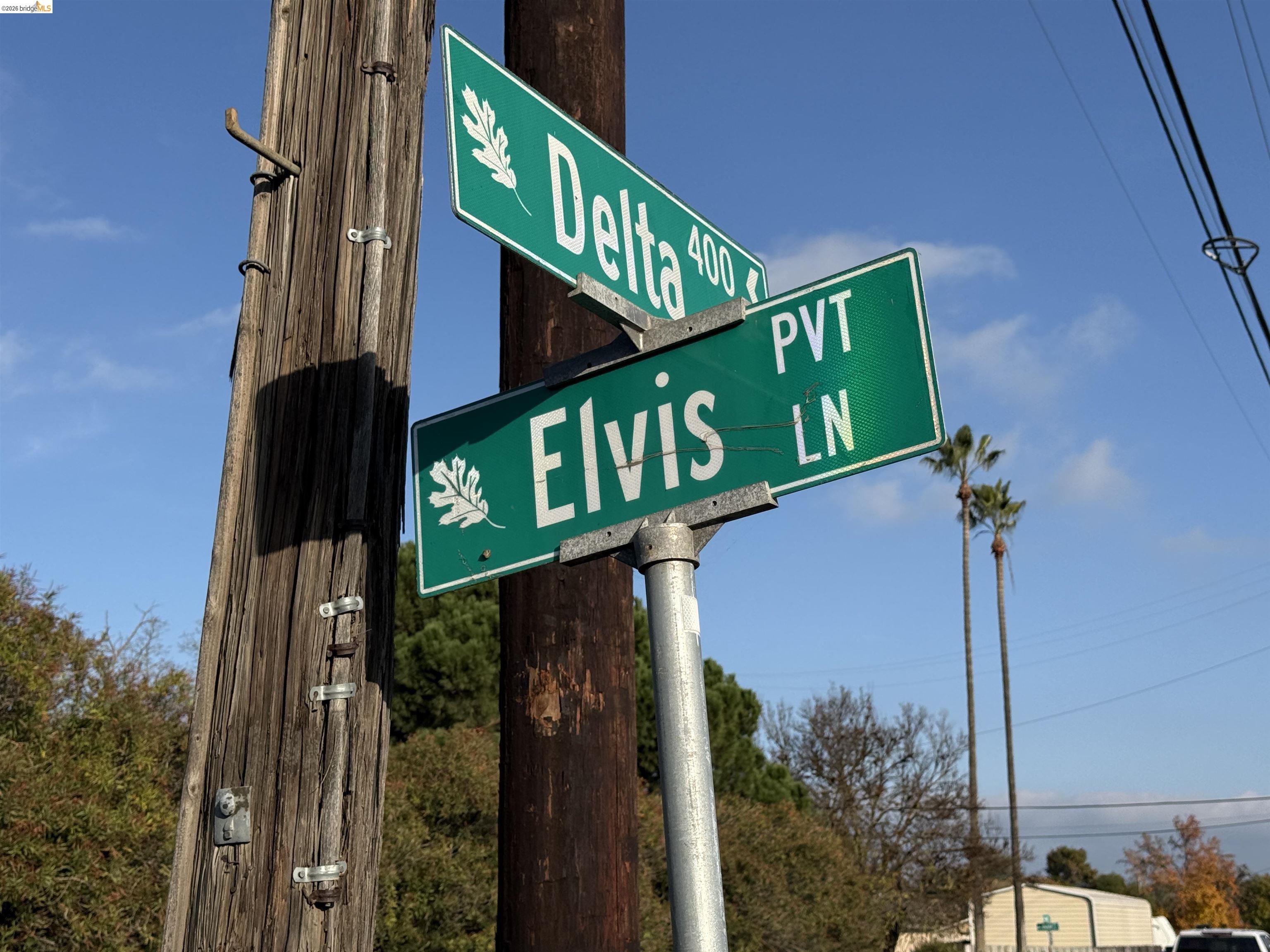 471 Delta Road Oakley, CA 94561 - Photo 9 of 33 a street sign on a pole on a street