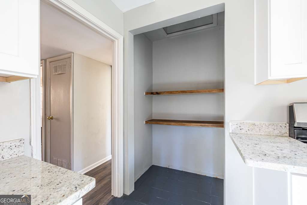 1570 Spring Lane Northwest, Unit B Atlanta, GA 30314 - Photo 12 of 26 a view of a kitchen with a sink