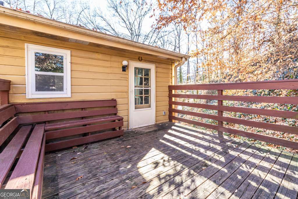 1570 Spring Lane Northwest, Unit B Atlanta, GA 30314 - Photo 23 of 26 a front view of a house with a garden