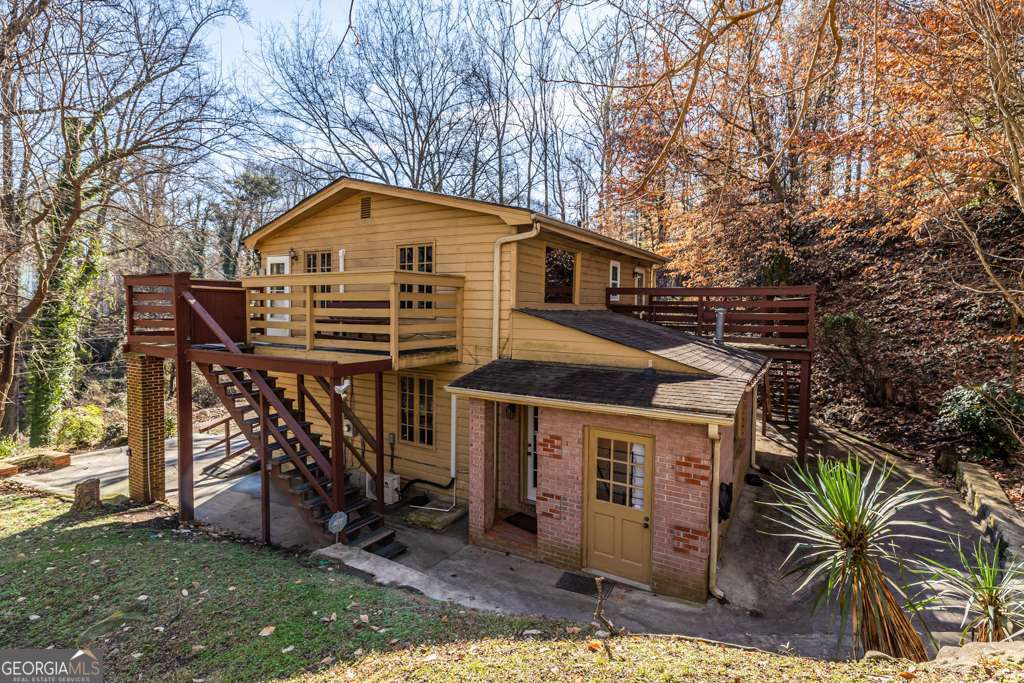 1570 Spring Lane Northwest, Unit B Atlanta, GA 30314 - Photo 26 of 26 a view of a house with a yard