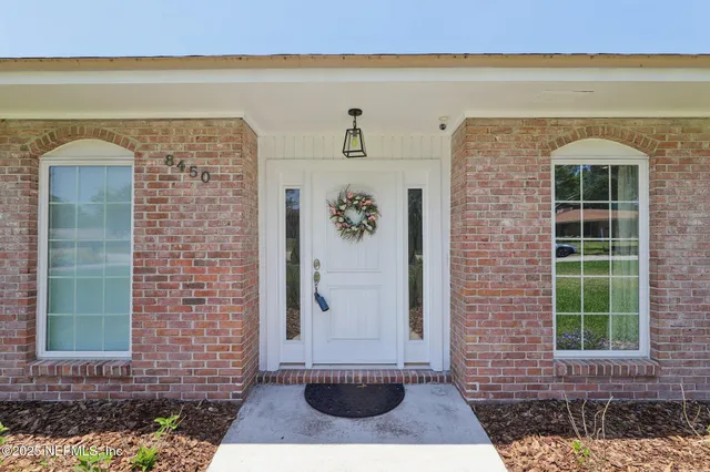 a front view of a house with a shower